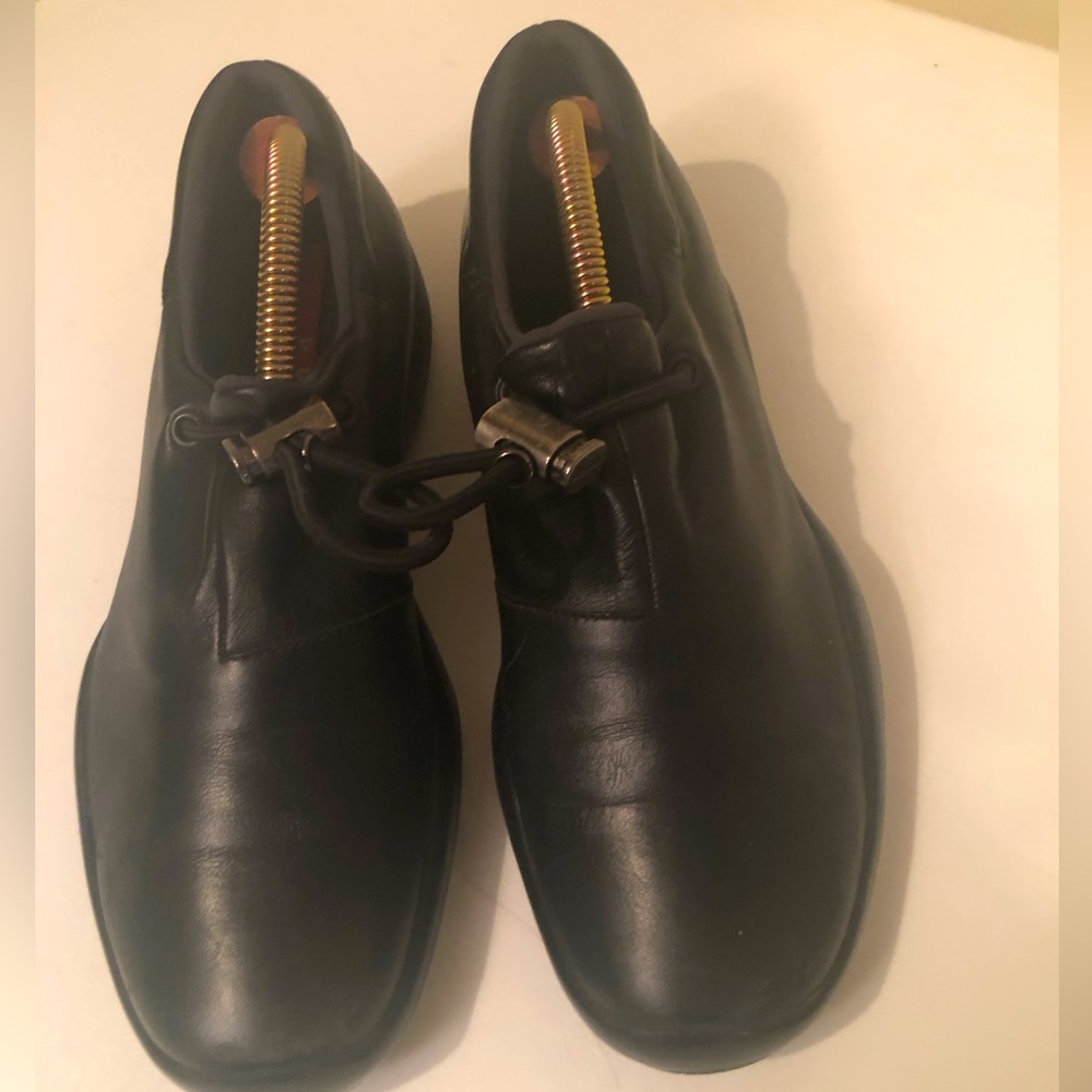 PRADA black leather loafers in good condition